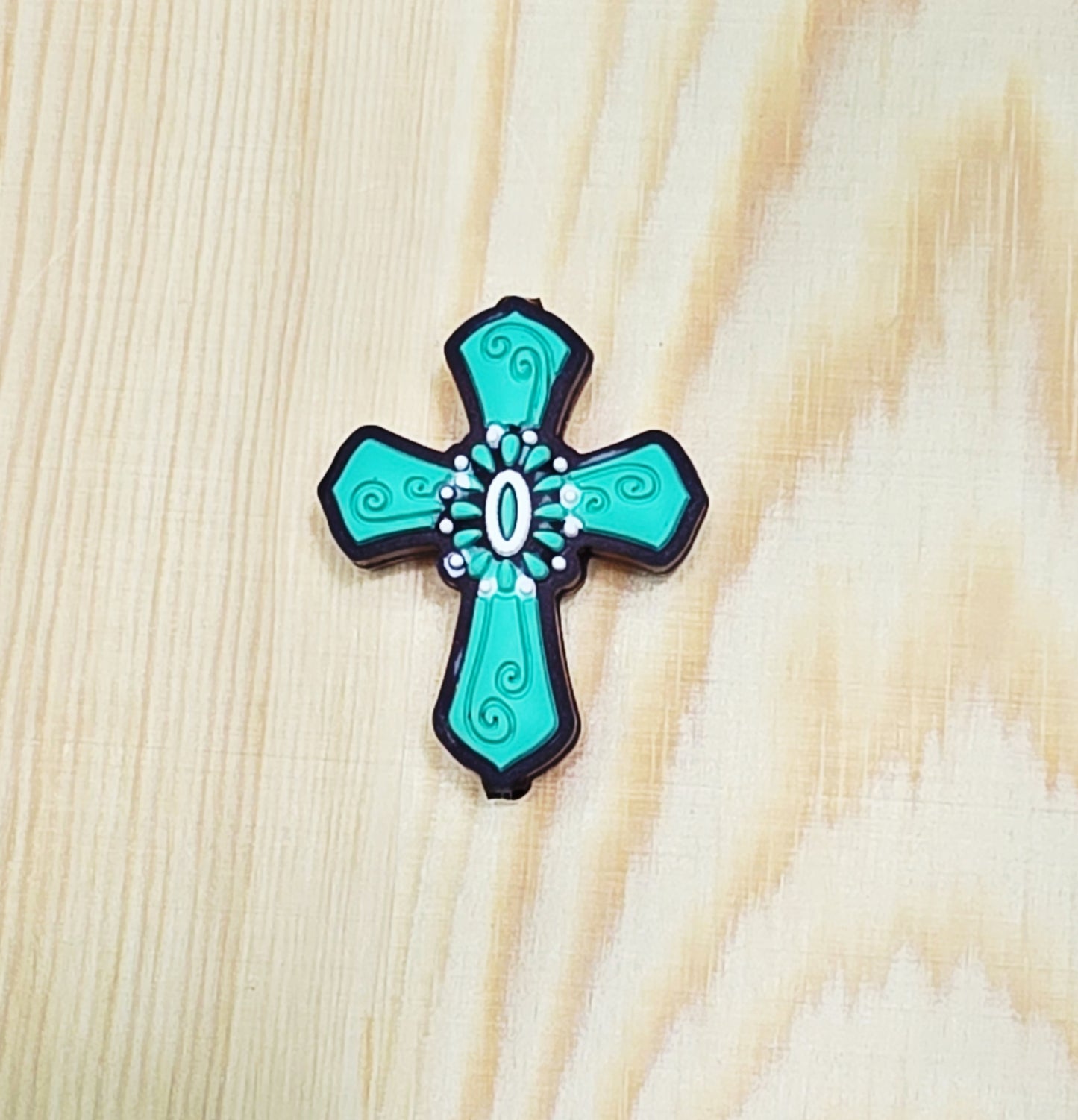 Teal cross silicone focal bead - A175