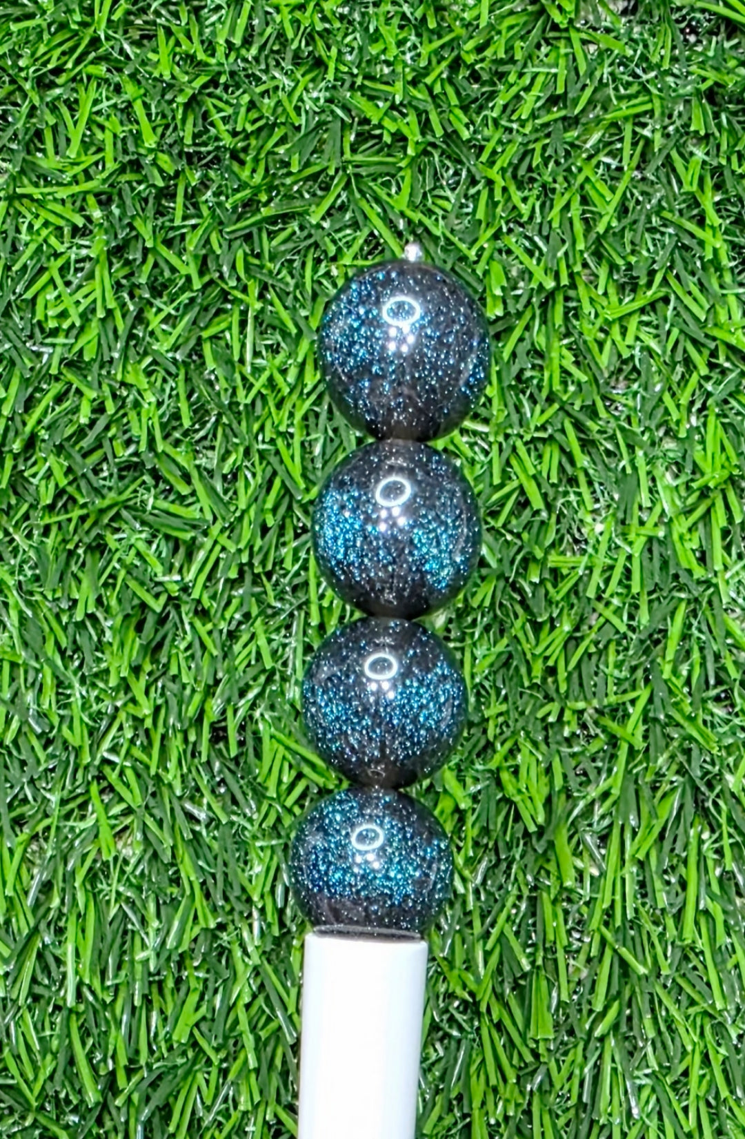 Black 16mm glow in the dark glitter acrylic beads