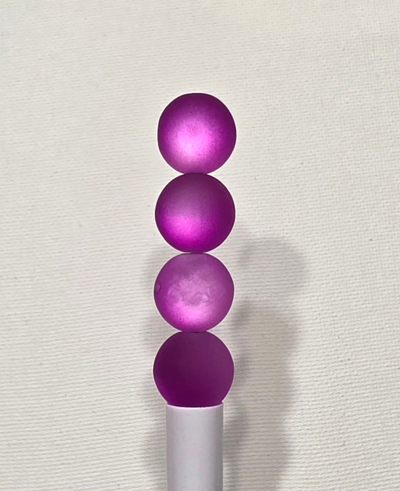 16mm frosted cat eye acrylic beads.