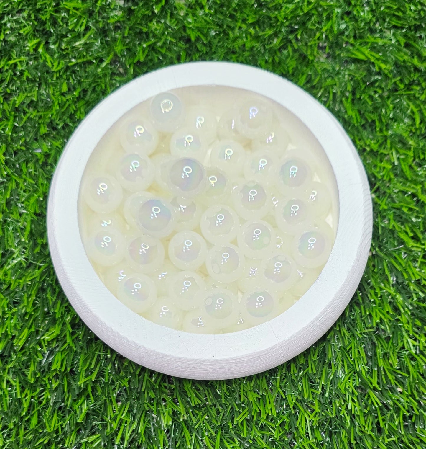 Glow in the dark white 16mm acrylic beads.