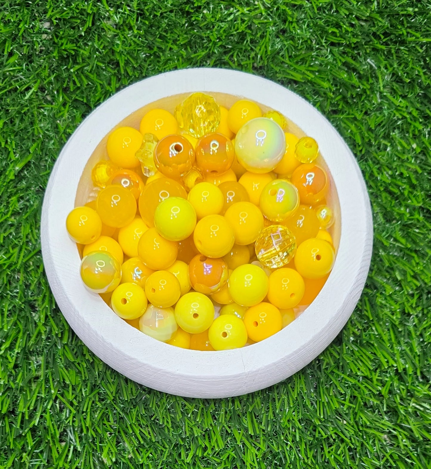 Mix acrylic beads in many different colors and sizes