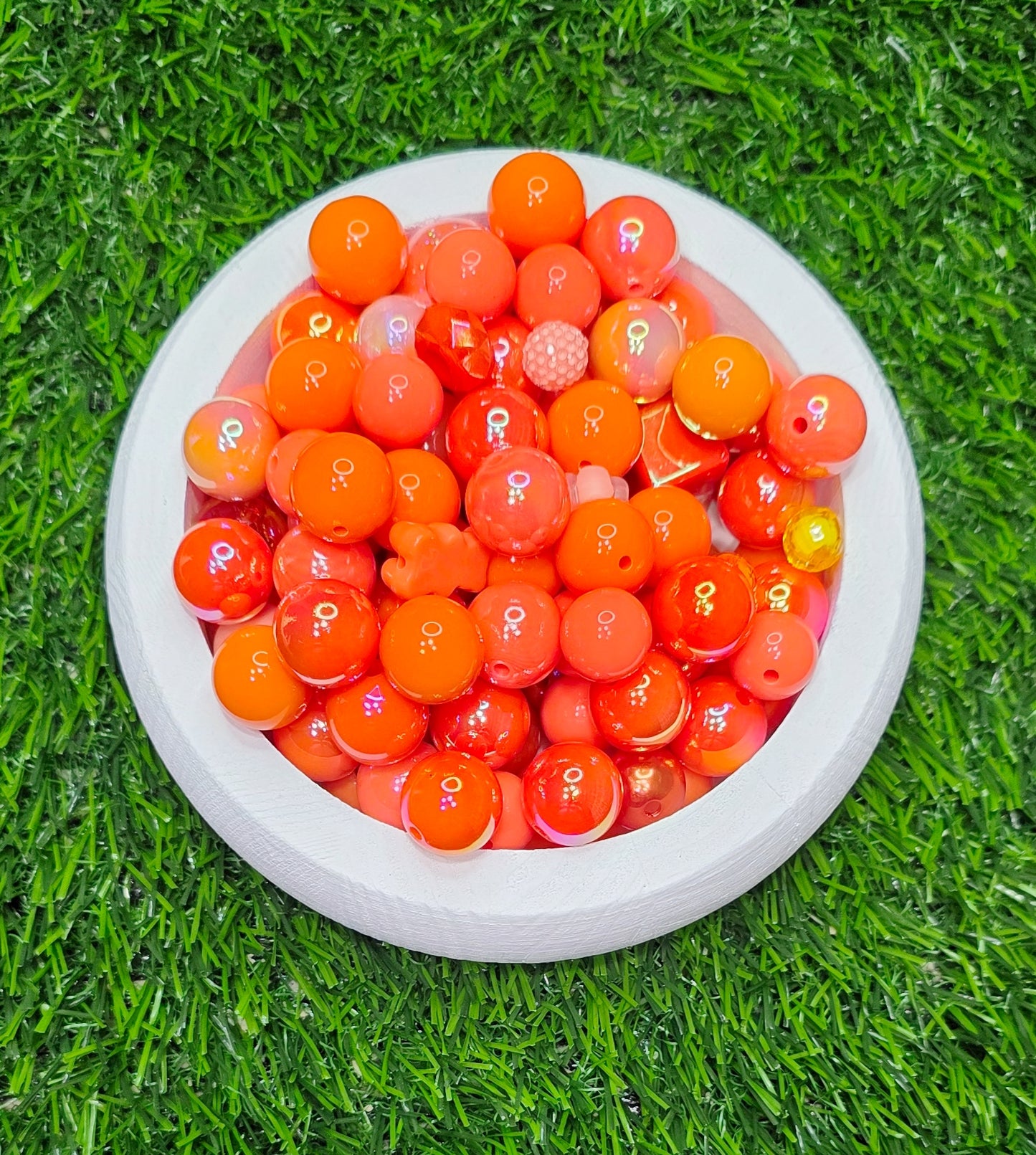 Mix acrylic beads in many different colors and sizes