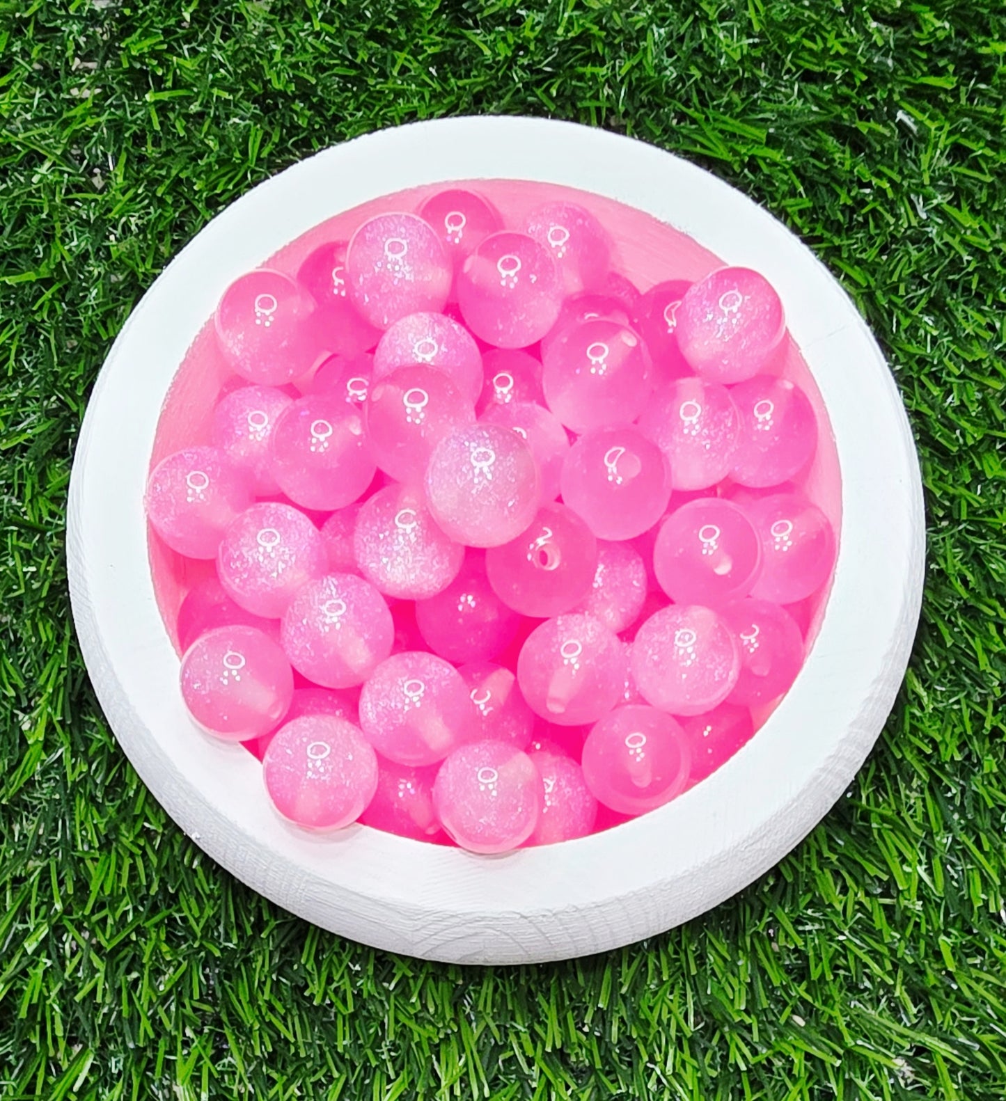 Pink 16mm glow in the dark glitter acrylic beads