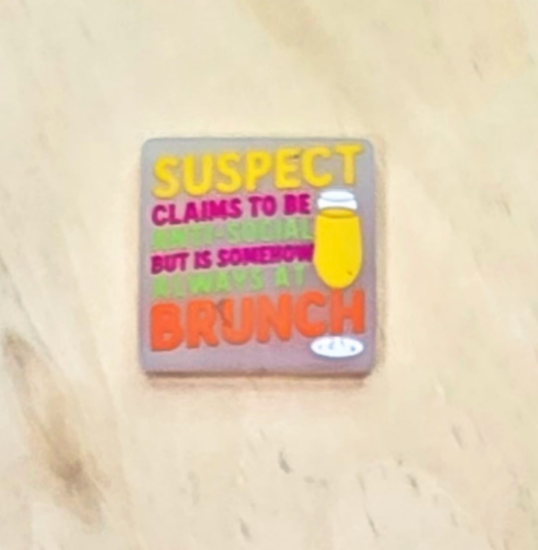 Suspect claims to be anti-social but somehow always at brunch silicone focal bead A582