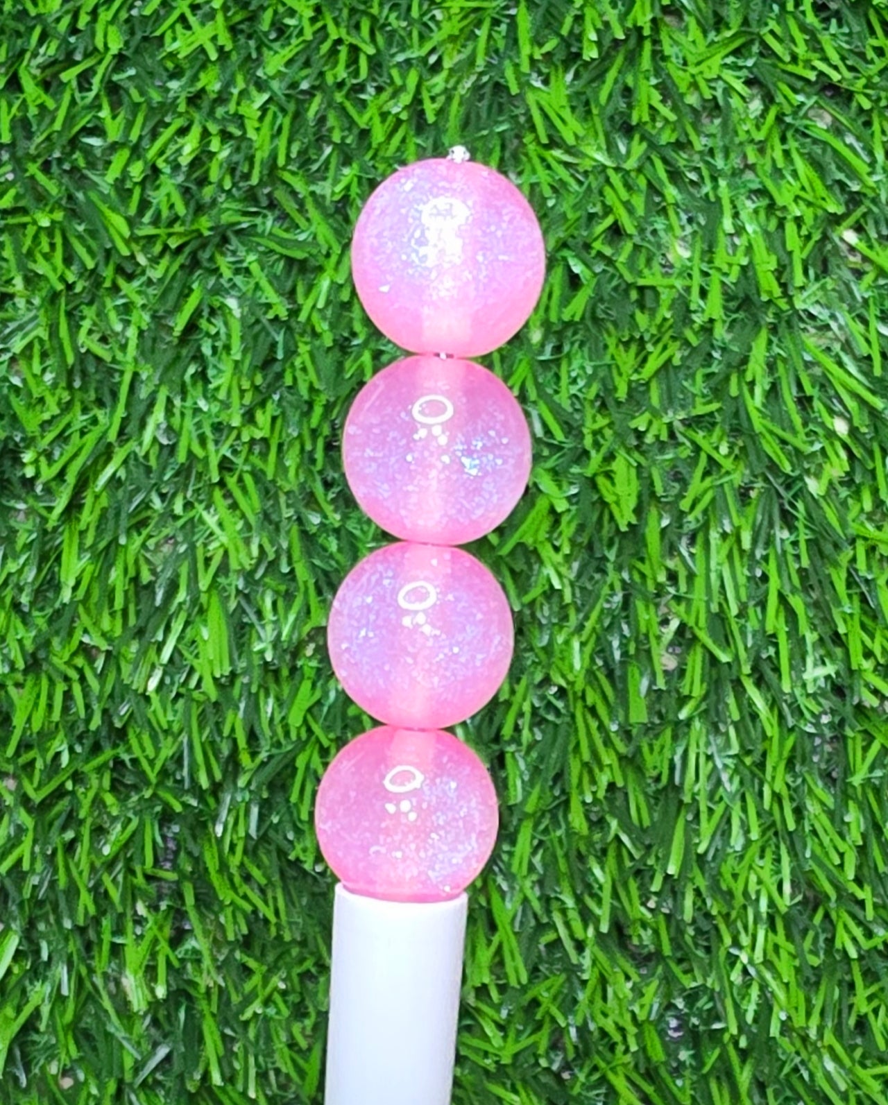 Pink 16mm glow in the dark glitter acrylic beads