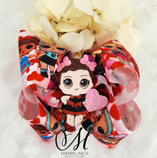 Boutique hairbow with a doll and heart shaker